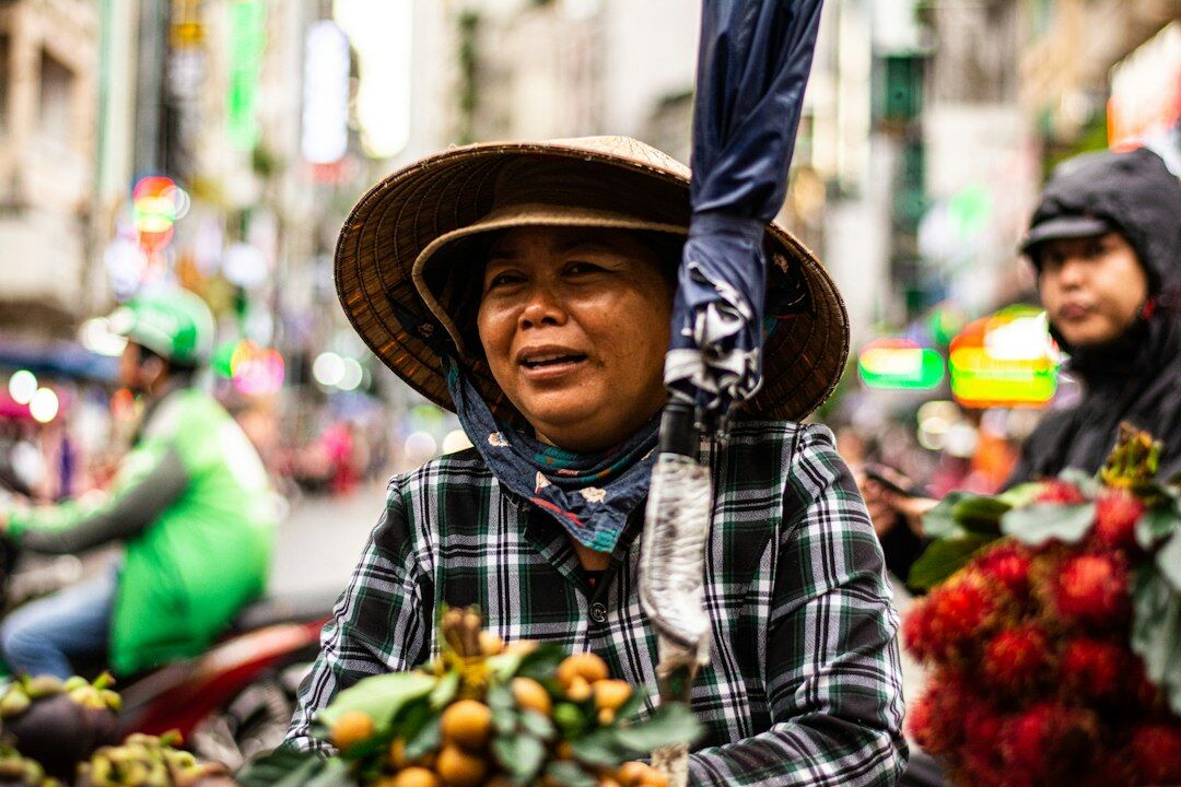 Chilean market vendor portrait with fresh produce